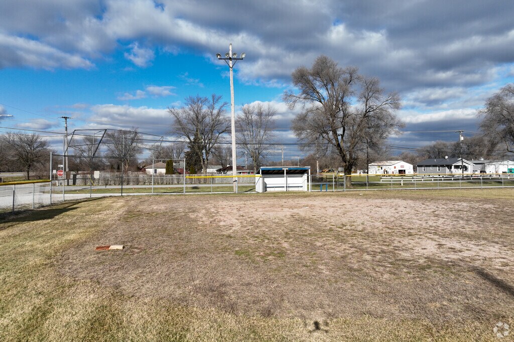 Play baseball at Lake Village Elementary School.