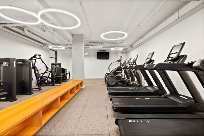 Fitness center with cardio equipment and free weights