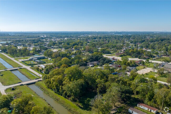 Barrett's scenic charm unfolds, featuring a meandering creek that enhances the allure.