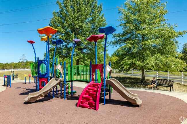 Thompson Park near Preserve South features a playground for children.