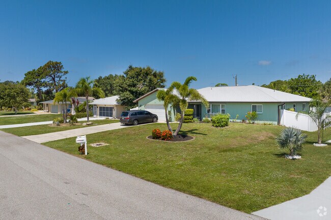 Old Englewood Village has rows of colorful ranch style homes off Bay Vista Blvd.