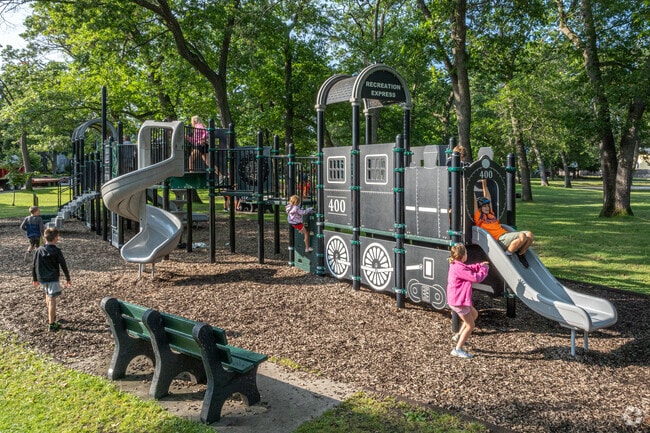 Kids love the train-themed playground at F & M Park in Traverse City, Michigan.