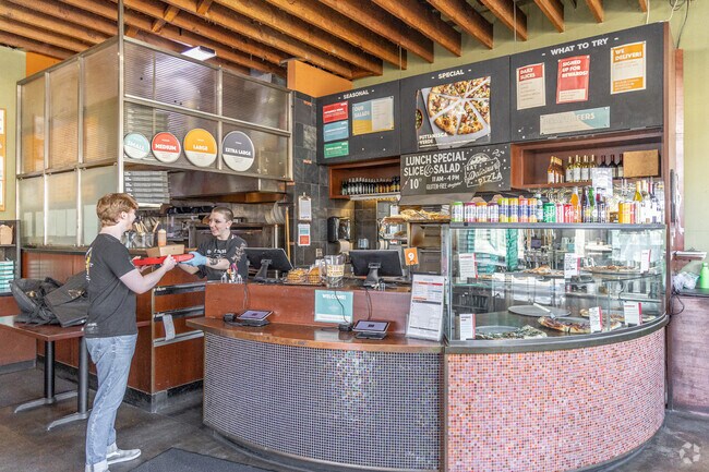 Pizzacato Pizza serves hand-tossed pizzas and specialty salads in South Tabor.