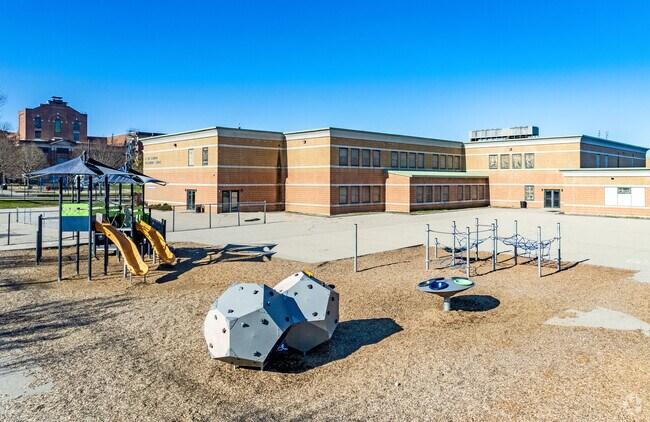 Students enjoy the playground at Young Jr Elementary in Lower South Providence, RI.