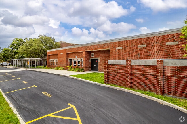 Kids enter the front entrance of North Shore Elementary School in Old Northeast, FL.
