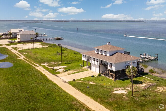 Spacious, coastal two-story homes fill on the Aransas Pass.