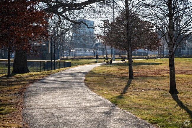 South Tiverton's residents enjoy paved paths at Maplewood Park.