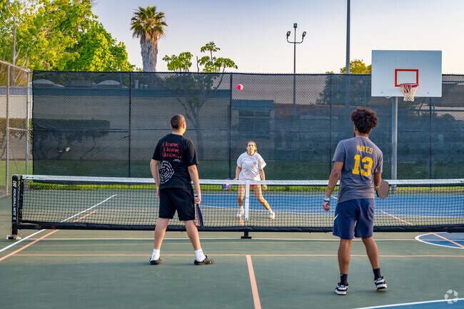 Friends gather for a game of pickle ball at Kearny Mesa Community Park in Clairemont Mesa East.