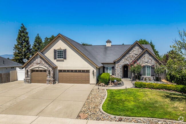 This custom-built home, in Country Heights, has a Tudor vibe architecture.