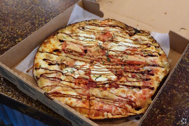 Ma's The Margarita is a pizza freshly cooked from Nashoba Pizza Club & Taproom.