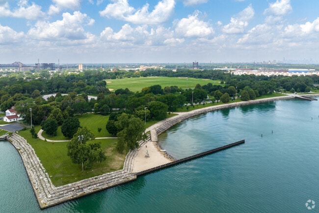 Aerial of Calumet Park on Lake Michigan, with open green space,
East Side, Chicago, IL.