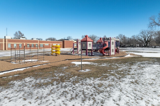 Kids can climb on the playground at Cessna Elementary School.