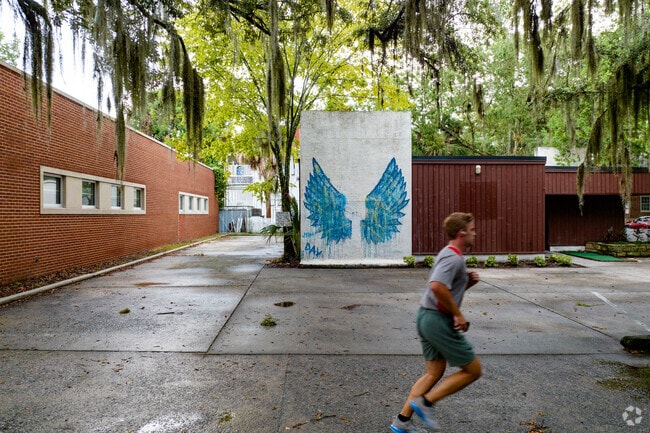 Residents can get a drink at The Blue Door Café then head outside for a picture at the wings.
