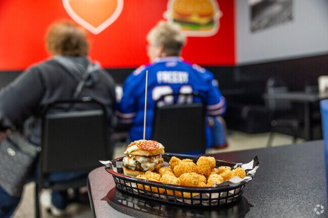 Try the burgers at Rock Burger with cajun seasoned tater tots on the side.