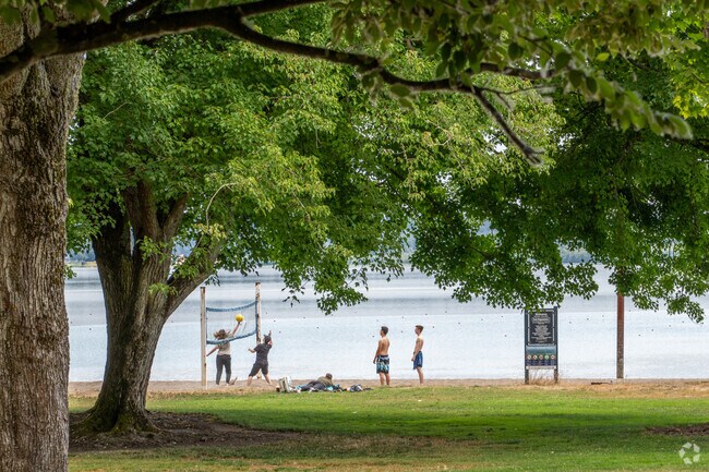 Vancouver Lake offers many recreational options, such as beach volley ball.