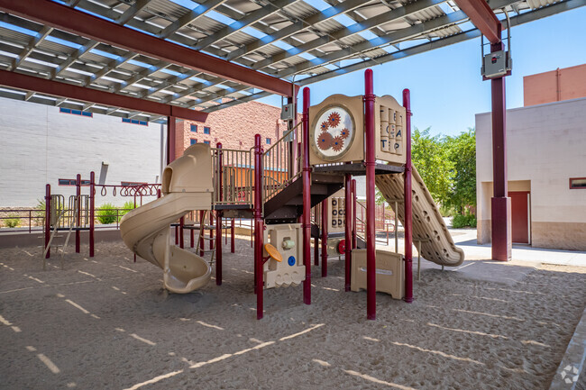 Children enjoy playtime on the engaging playground at Sunnyslope Elementary School in Phoenix.