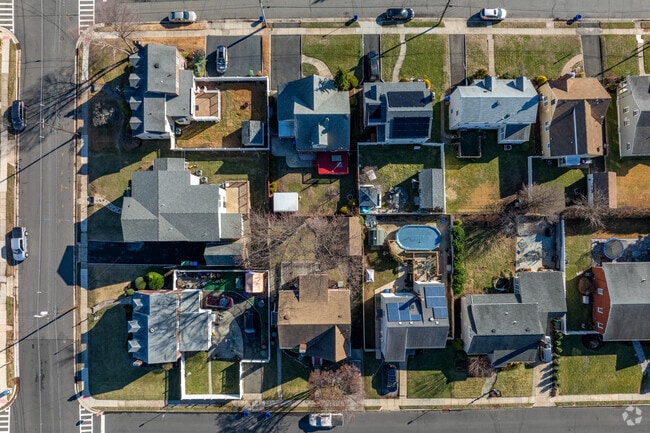 Linden provides a suburban charm with sidewalks, yards, and driveways for residents.