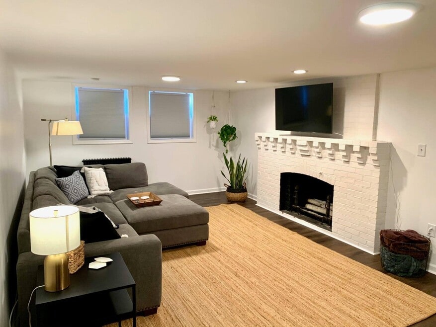 Spacious living room with flat screen tv