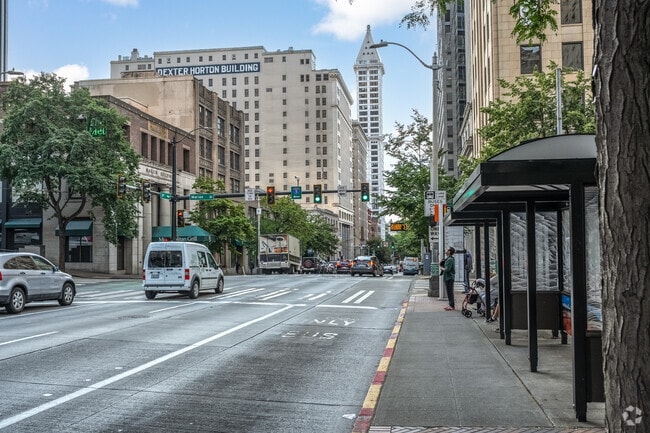 A transit stop on 4th Avenue serves daily riders in Downtown Seattle's core.