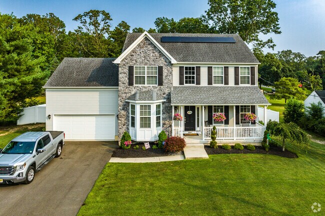 New Traditional homes appear on recently developed streets in Waterford Township.