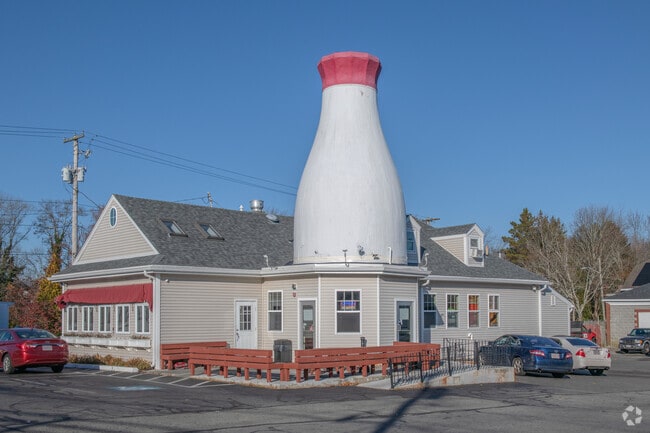 G&S Pizza occupies the historic milk bottle building in the Acushnet / Pine Hill neighborhood.