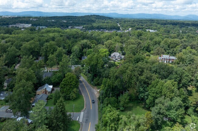 Barracks Road itself traverses through Barracks Road and Barracks Rugby neighborhoods.