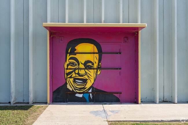 A colorful mural is displayed on a wall of Casa Loma County Park.