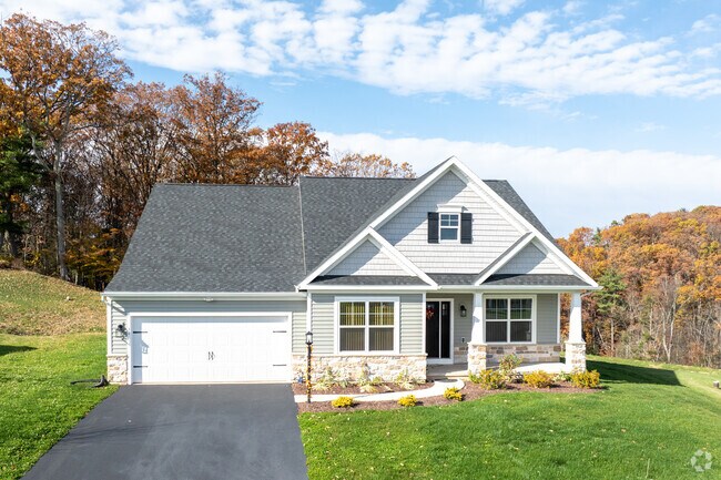 Cape Cod cottages, with brick siding can be found in Hemlock.
