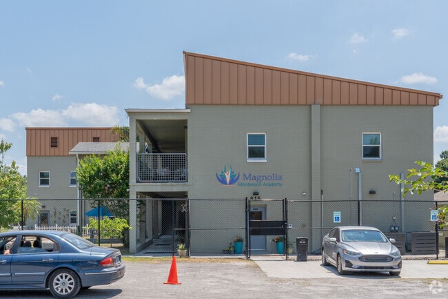 Magnolia Montessori Academy is a two-story building with large play areas.