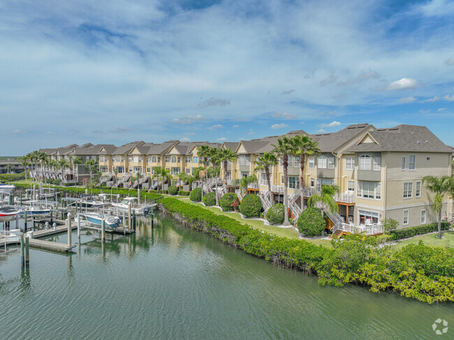 Condominiums have private docks in Rocky Point with water views.