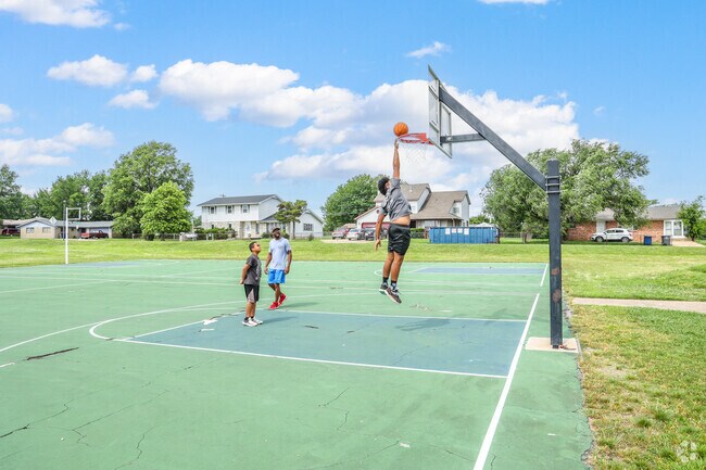 Chamberlain Park is the perfect place near Carriage Trail to shoot some hoops with the family.