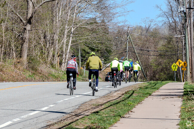 People have fun with their bicycles and friends on the streets of Hebron, CT.