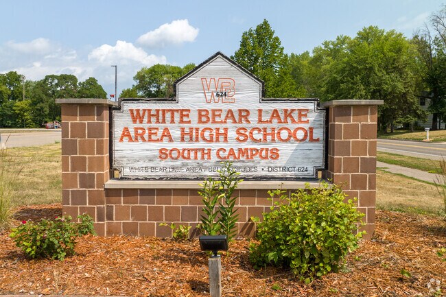 Growing in knowledge students achieve greatness White Bear Lake Area High School - South Campus.