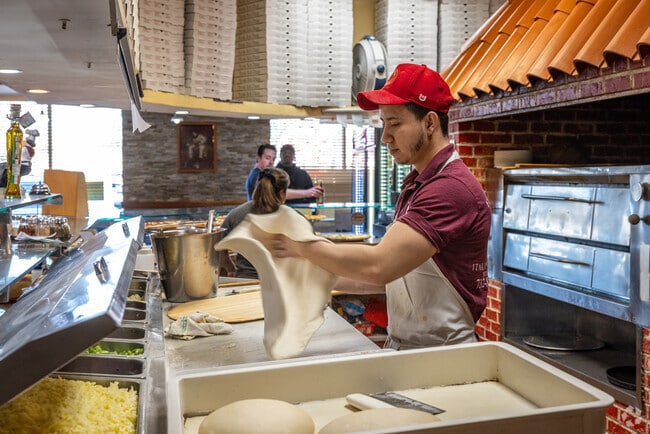Dough is meticulously handled at Frank's Pizza & Trattoria in Bound Brook, NJ.