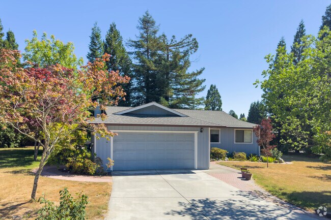 Graton has many midcentury homes nestled among towering trees, blending modern design with serene surroundings.