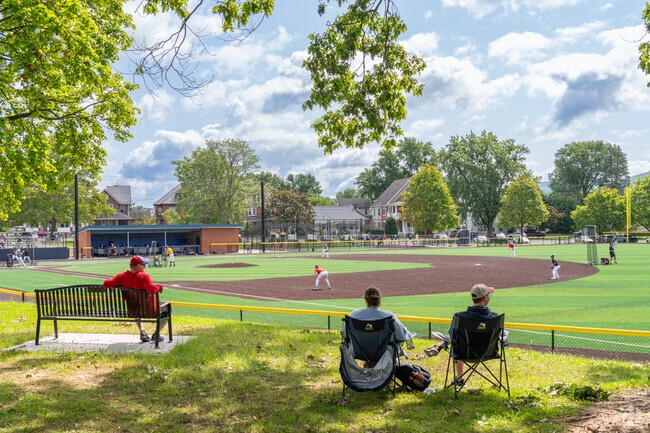 Parents enjoy watching their kids play baseball on the beautiful field at Brandon Park.