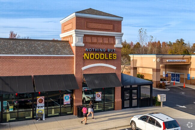 Enjoy a meal with friends at Nothing but Noodles, just down the road from The Palisades.