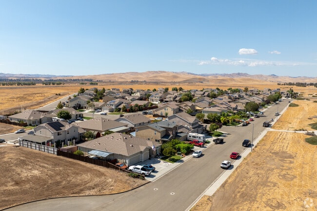 Open space backs several Santa Nella blocks for added breathing room.