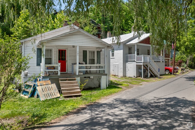 Rows of bungalows shaded by weeping willows line the quiet streets of Scottsville, VA.