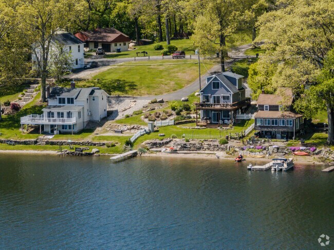 These homes often come with private docks or beachfront access, perfect for boating and fishing.