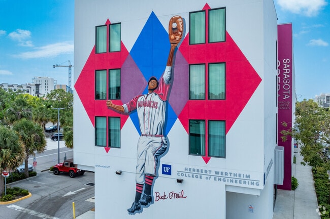 Murals reflect significant individuals like Buck O'Neil who lived in Sarasota near Amaryllis Park.