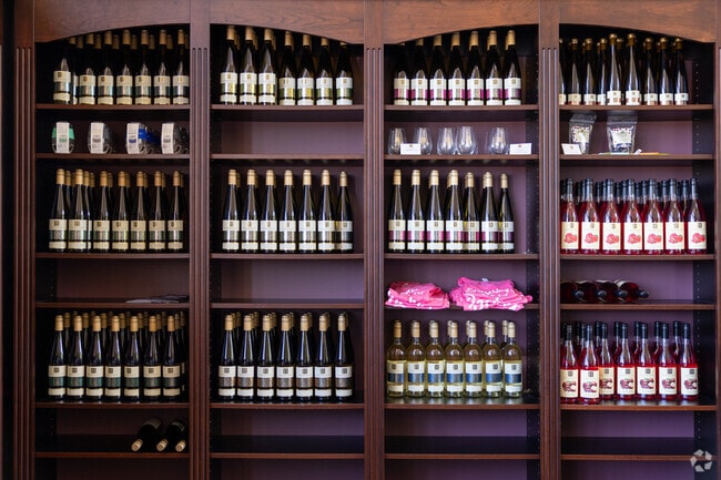 Chateau Grand Traverse showcases its vintages in a dark wood display in Traverse City.