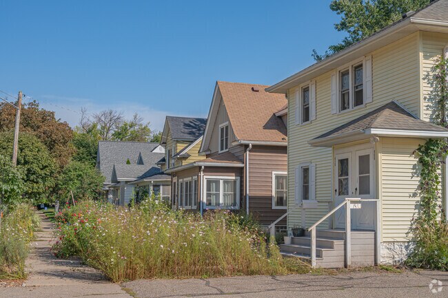 Rows of homes with lush gardens set the tone for the Harrison landscape.