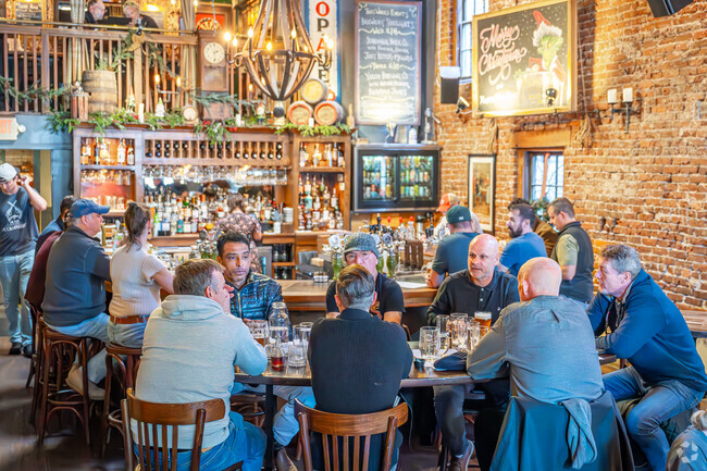 Locals gather at the popular Brick Store Pub for daily specials in College Heights.