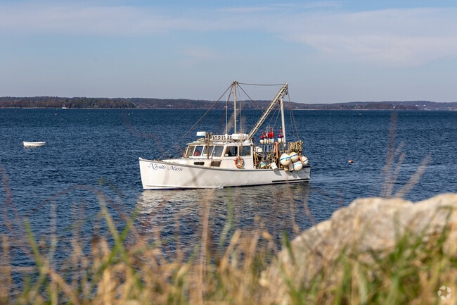 Working lobster boats are often anchored off the shore of Long Island.
