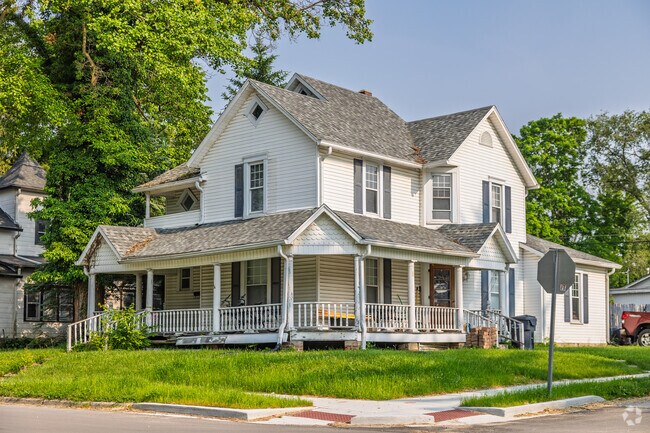 An older farm house occupies a corner lot in Eaton.