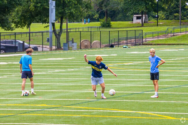 Westover Hills locals practice soccer on the field at Revolution Park.