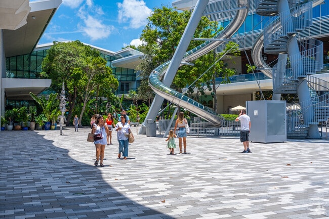 Outdoor spaces at Aventura Mall offer seating near upscale shops.