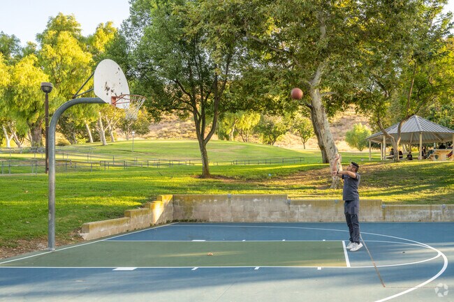Shoot some hoops at the basketball courts at Butterfield Park.