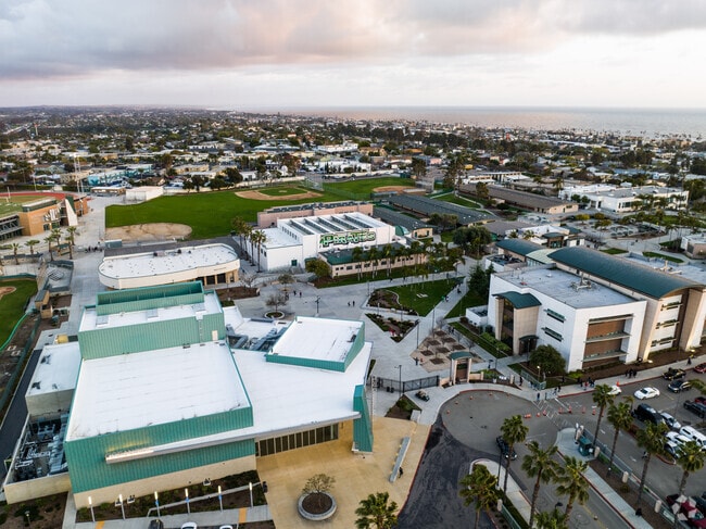 Oceanside High School has a nice exterior design with the sports fields in the distance.